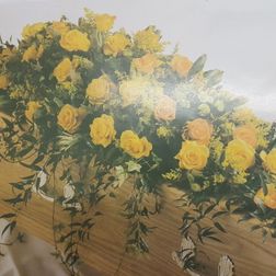 Coffin spray of all roses 4ft from £150. 5ft from £195