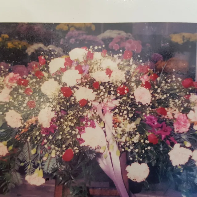 Coffin spray approx 4ft mixed seasonal flowers from £95