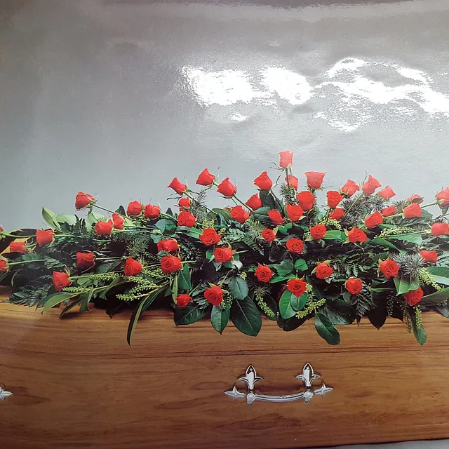 Coffin spray of all roses 4ft from £150. 5ft from £195